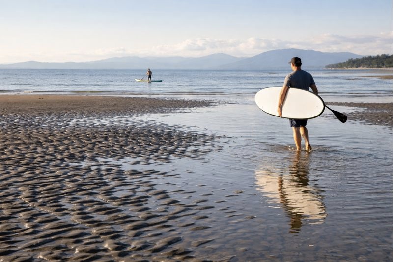 surfing at beach with professional paddleboarders 2023 Centennial Beach Day Trip Ideas in Delta, BC surfing at beach with professional paddleboarders